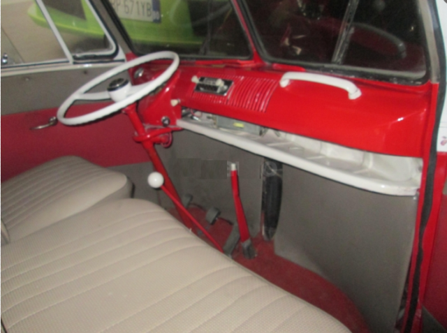 1965 red Volkswagen Beetle - Classic Minivan