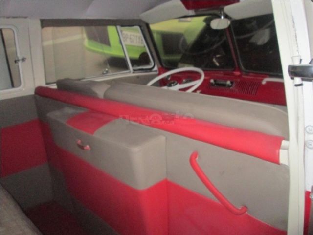 1965 red Volkswagen Beetle - Classic Minivan