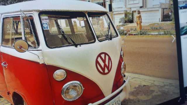 1965 red Volkswagen Beetle - Classic Minivan