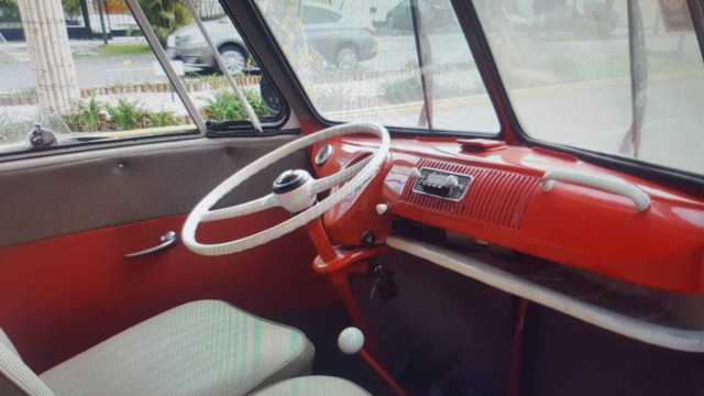 1965 red Volkswagen Beetle - Classic Minivan