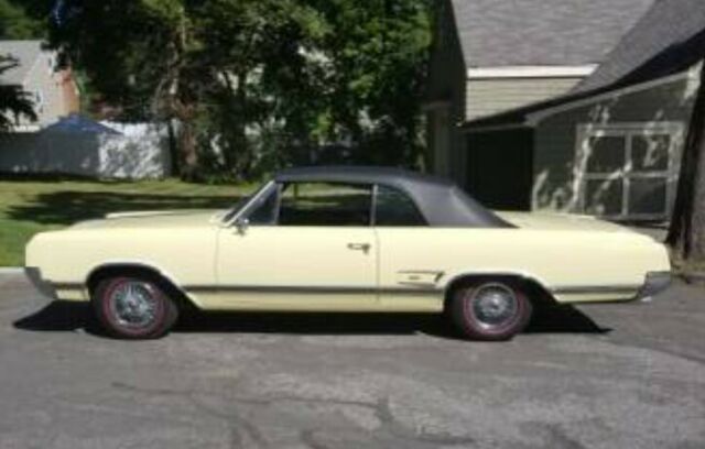 1965 Yellow Oldsmobile 442 Convertible