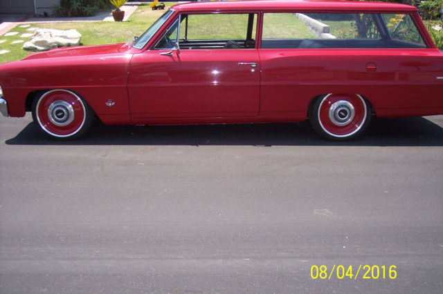 1966  red Chevrolet Nova 2 dr wagon