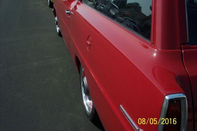 1966  red Chevrolet Nova 2 dr wagon