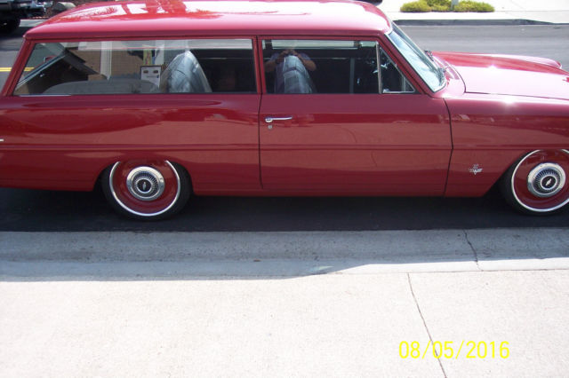 1966  red Chevrolet Nova 2 dr wagon