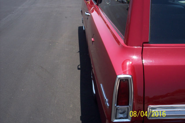 1966  red Chevrolet Nova 2 dr wagon