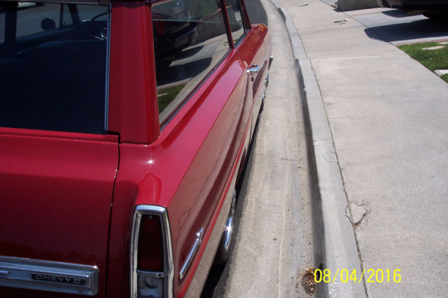 1966  red Chevrolet Nova 2 dr wagon