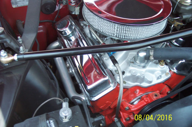 1966  red Chevrolet Nova 2 dr wagon