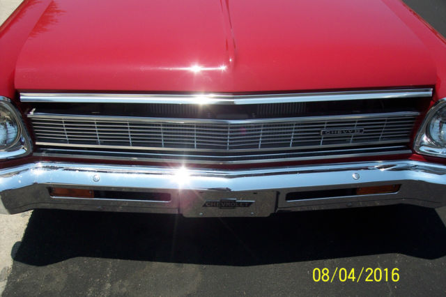 1966  red Chevrolet Nova 2 dr wagon