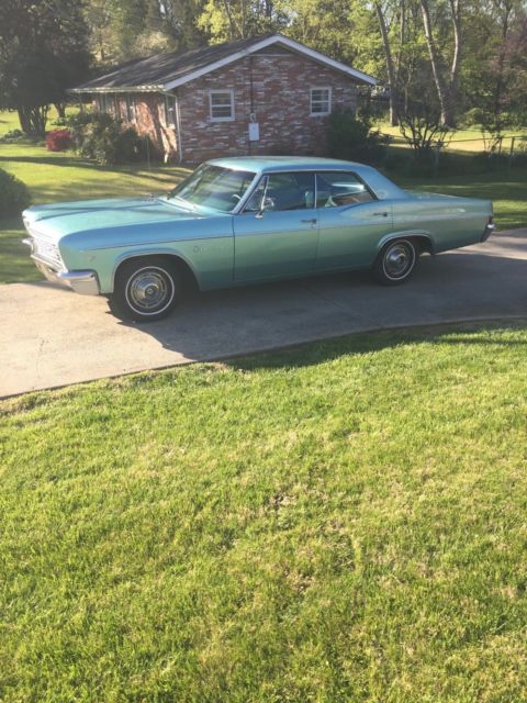 1966 turquoise Chevrolet Impala 4dr hardtop