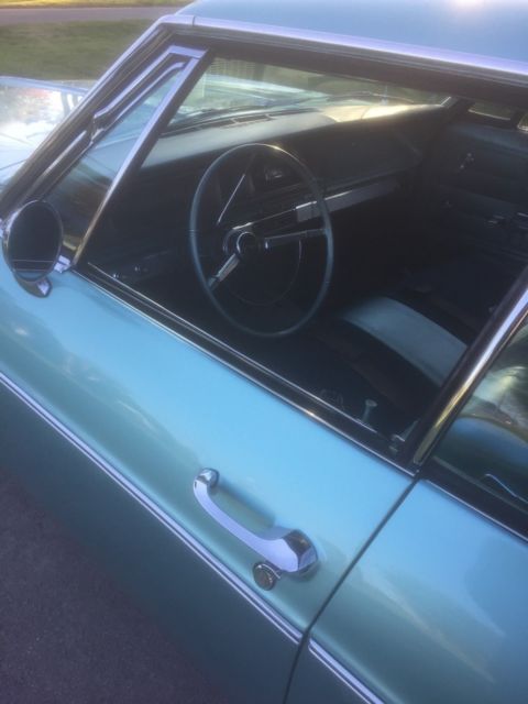 1966 turquoise Chevrolet Impala 4dr hardtop