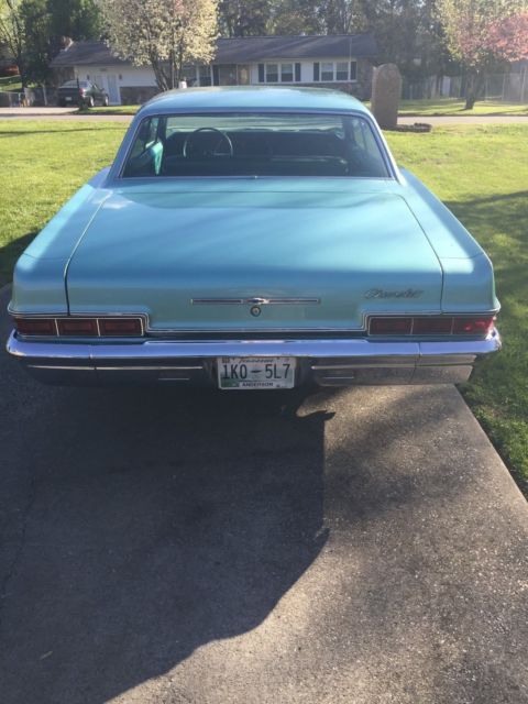 1966 turquoise Chevrolet Impala 4dr hardtop