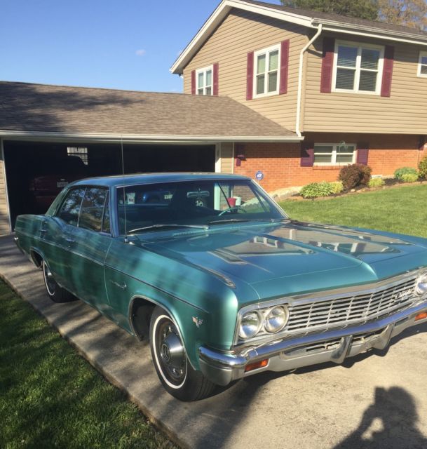 1966 turquoise Chevrolet Impala 4dr hardtop