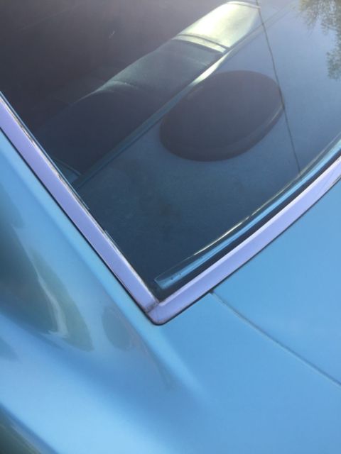 1966 turquoise Chevrolet Impala 4dr hardtop