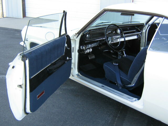 1965 White Chevrolet Impala Coupe