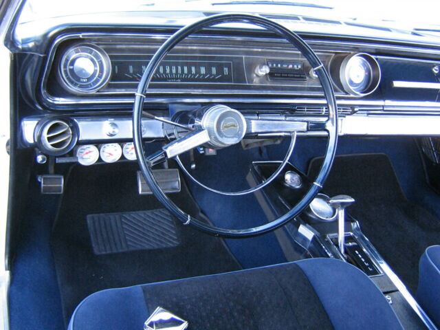 1965 White Chevrolet Impala Coupe