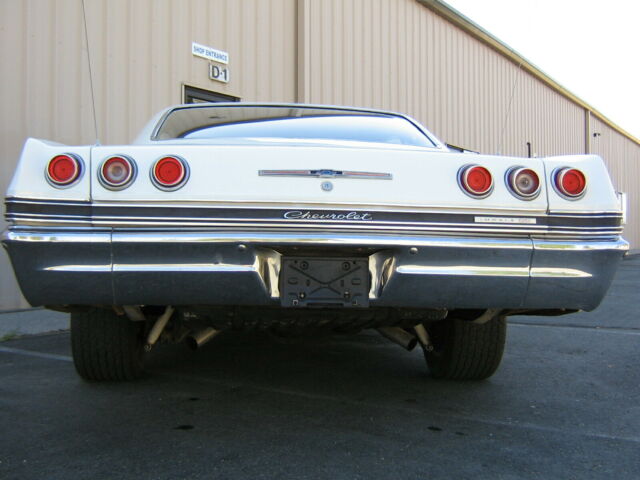 1965 White Chevrolet Impala Coupe