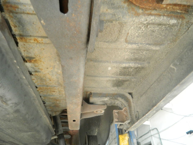 1966 black Cadillac DeVille convertible