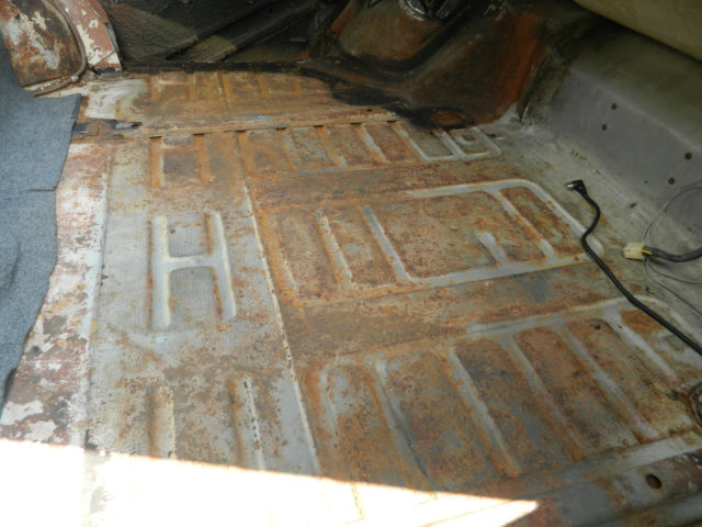 1966 black Cadillac DeVille convertible