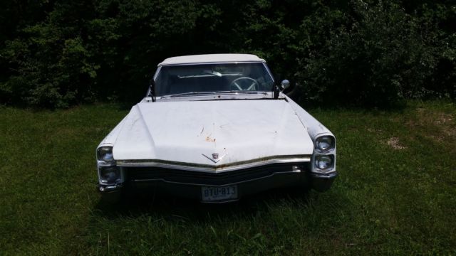 1966 White Cadillac DeVille Convertible