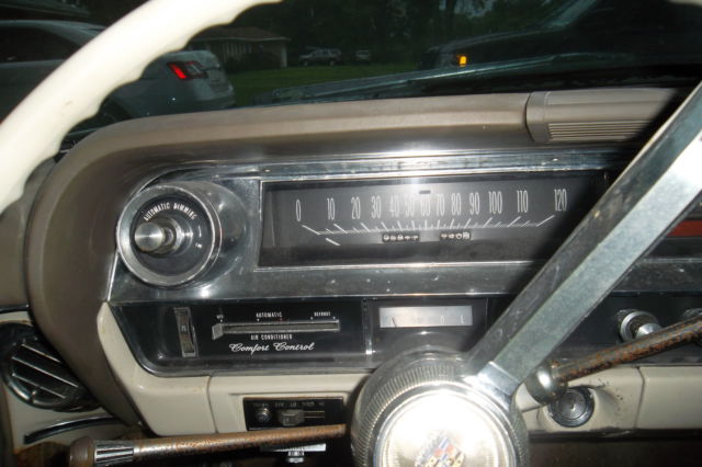 1966 White Cadillac DeVille Convertible
