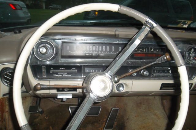 1966 White Cadillac DeVille Convertible