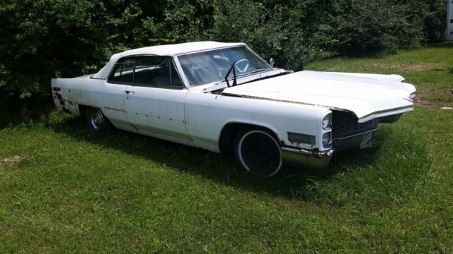 1966 White Cadillac DeVille Convertible
