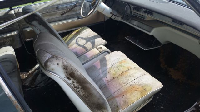 1966 White Cadillac DeVille Convertible