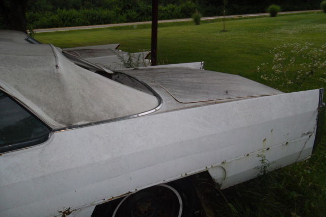 1966 White Cadillac DeVille Convertible