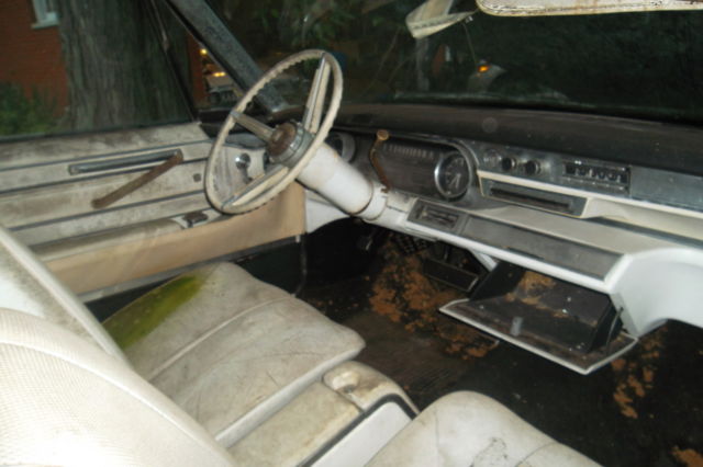 1966 White Cadillac DeVille Convertible