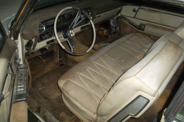 1966 White Cadillac DeVille Convertible