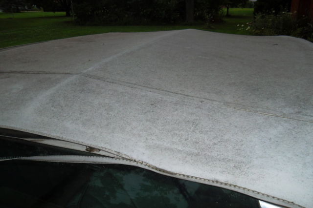 1966 White Cadillac DeVille Convertible