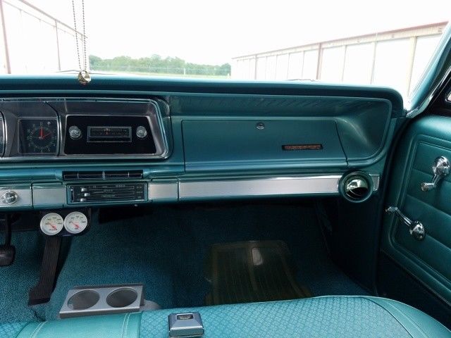 1966 Turquoise Chevrolet Impala 4 Door Hard Top