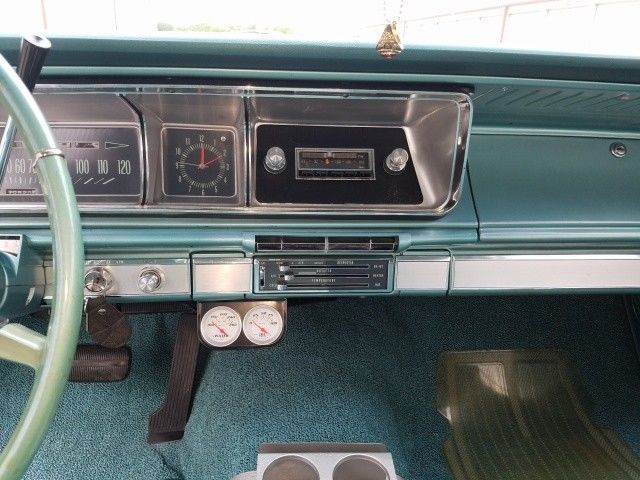 1966 Turquoise Chevrolet Impala 4 Door Hard Top