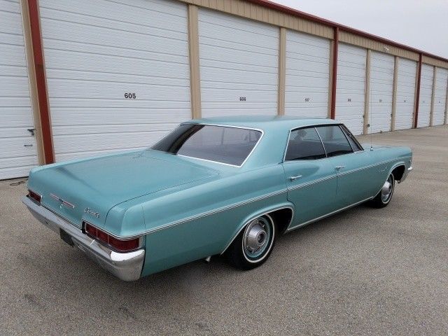 1966 Turquoise Chevrolet Impala 4 Door Hard Top