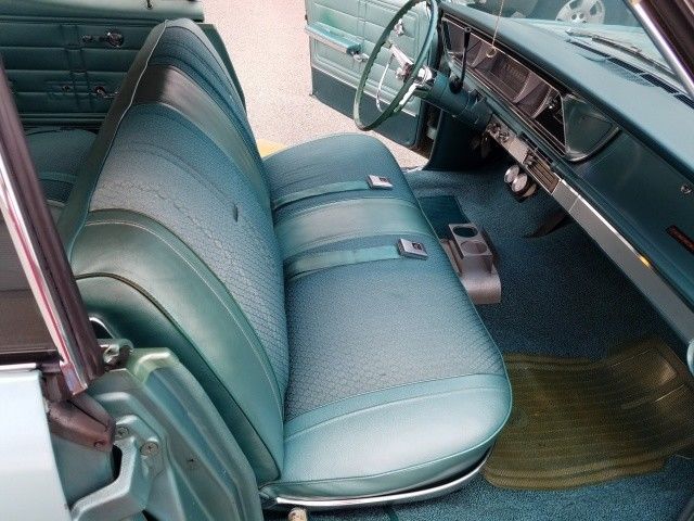 1966 Turquoise Chevrolet Impala 4 Door Hard Top