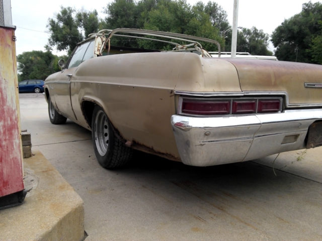 1966 Gold Chevrolet Impala Convertible