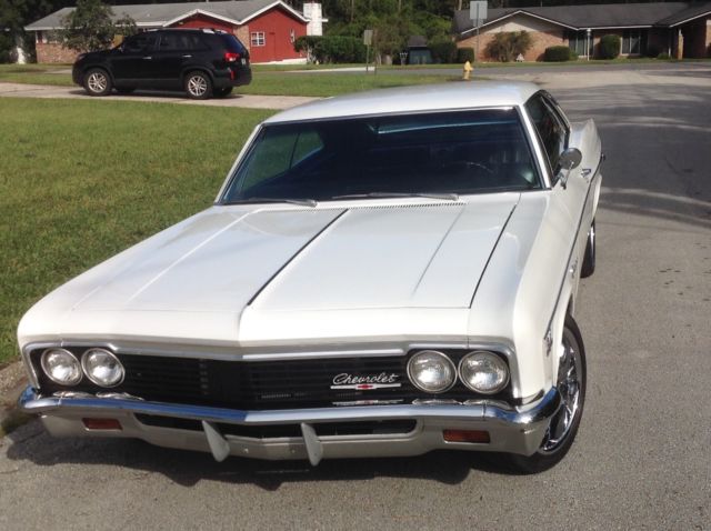 1966 White Chevrolet Impala