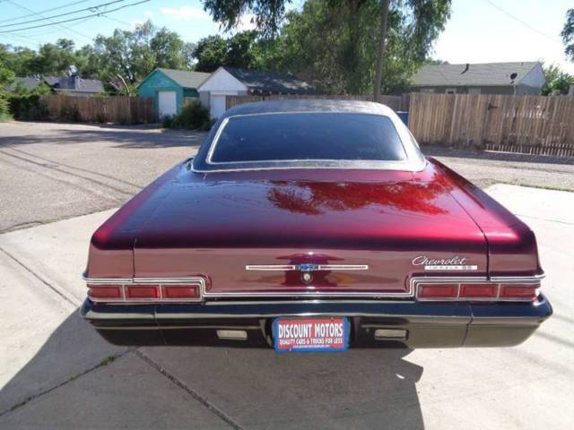 1966 Burgundy Chevrolet Impala Coupe