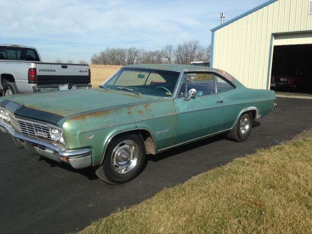 1966 white Chevrolet Impala Coupe