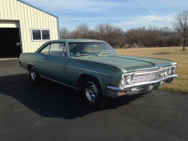1966 white Chevrolet Impala Coupe