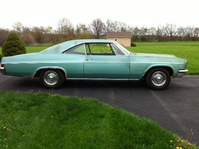 1966 white Chevrolet Impala Coupe