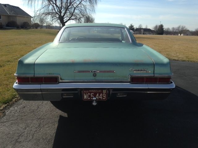 1966 white Chevrolet Impala Coupe