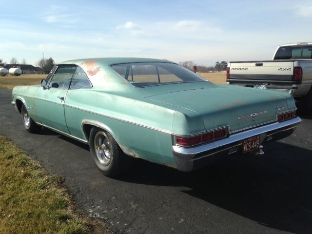 1966 white Chevrolet Impala Coupe