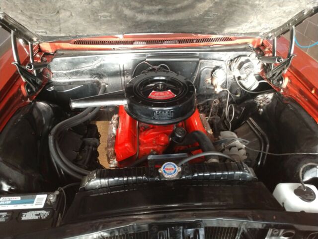 1966 Maroon Chevrolet Impala Coupe