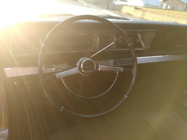 1966 Maroon Chevrolet Impala Coupe