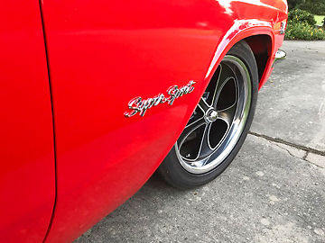 1966 Red Chevrolet Impala Coupe