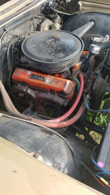 1966 Gold Chevrolet Impala Coupe