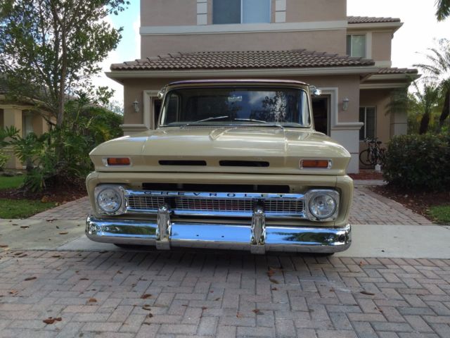 1966 beige and crimson Chevrolet C-10 fleetside long bed
