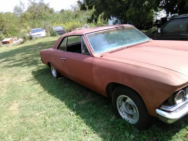 1966 black Chevrolet Chevelle Coupe