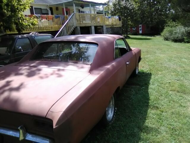 1966 black Chevrolet Chevelle Coupe